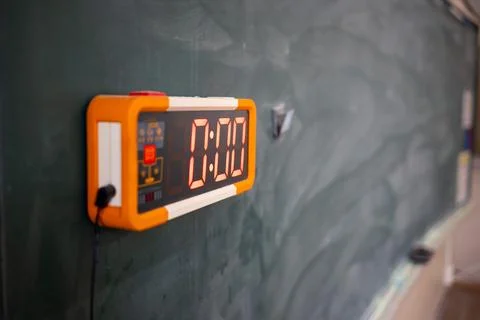 Classroom timer clock on the blackboard in a Japanese school.  Stock Photos