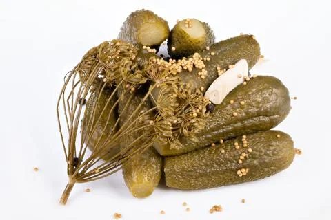 Classy presentation of pickled cucumbers with pepper and dill accents. Soph.. Stock Photos