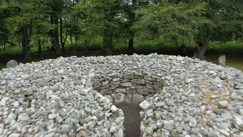 Clava Cairns Drone Flying backwards out of Burial Chamber, Scotland 4K Stock Footage 145924504