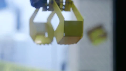 Claw machine game attempting to pickup stuffed animal toy Stock-Footage 104072122