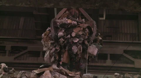Claw Sorting Trash in Waste Facility Video stock 42148617