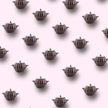 Clay baking pot pattern on pink background. Minimal kitchen concept. Stock Photos