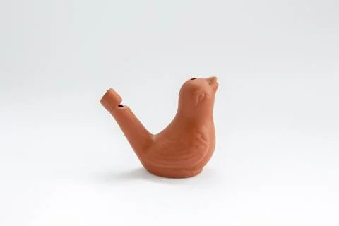 Clay bird on a white background Stock Photos