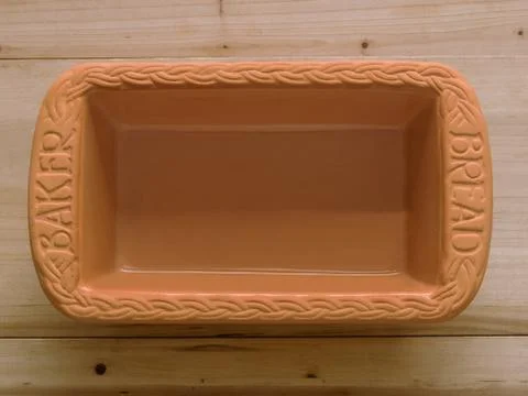 Clay bread baking pan Stock Photos