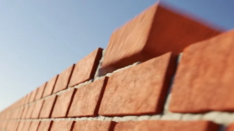Clay brick wall being build. Stock Footage 85932153