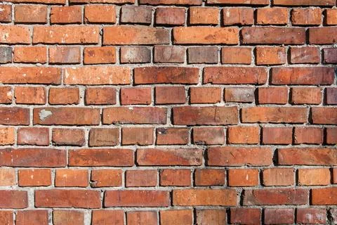 Clay brick wall Stock Photos