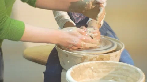 A Clay Crafr is Made by a Laborious Blonde Girl Who Learns the Old Craft of Stock Footage 59126941