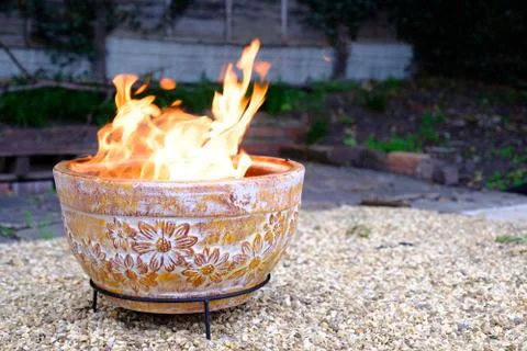 Clay Fire Pit in Back Garden Stock Photos