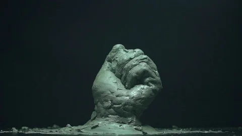 Clay hand points to the left of the screen 스톡 동영상 125990495