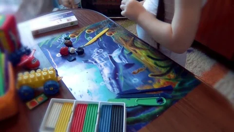 Clay in the hands of a child Stock Footage 70123248