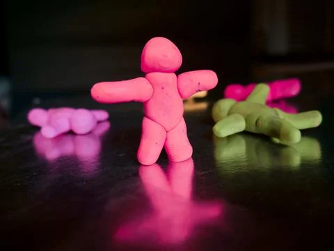 Clay man stand alone while all people lying on floor motivation concept 스톡 사진