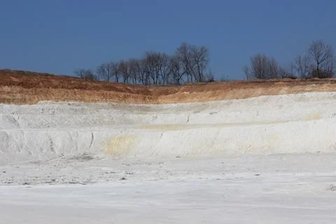 Clay mining. Beautiful background of white clay. Stock Photos