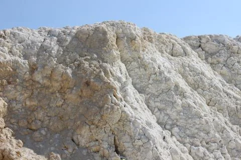 Clay mining. Beautiful background of white clay. Stock Photos
