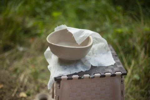 Clay modeling. Object made of untreated clay on street. Details of master cla Stock Photos