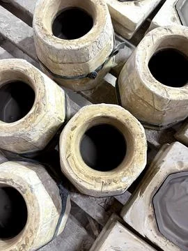 Clay molds used for creating unique pottery pieces are displayed at a ceram.. Stock Photos