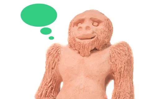 Clay monkey thinking  on a white background 스톡 사진