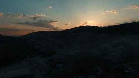 Clay mountains and sunset Stock Footage 110845893