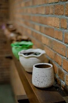 Clay mug with blurred background Stock Photos