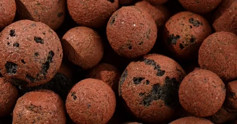 Clay pebbles, expanded clay, weed protection, orchard and garden substrates Stock Footage 250277620