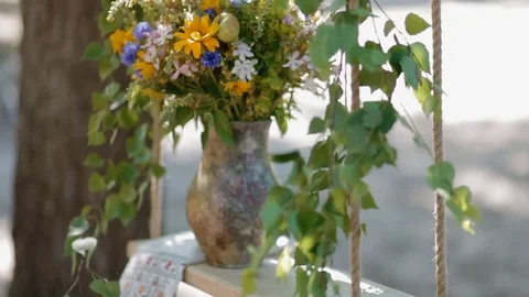 Clay pot with fresh flowers Stock Footage 76609047