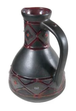 Clay pot of manual work. It is possible to store milk or other liquid Stock Photos