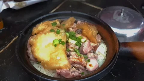 Clay pot rice. Stock Footage 306965491