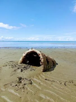 A clay pot on the sand at the beach Stock Photos