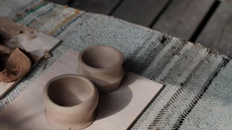 Clay pot is on the table Stock Footage 136380438