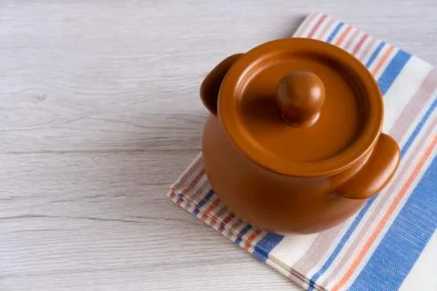 Clay pot on the table Stock Photos