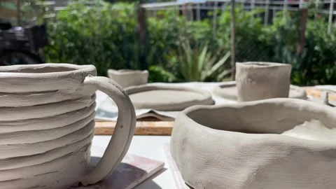 Clay pottery drying out on the sun Stock Footage 278427680