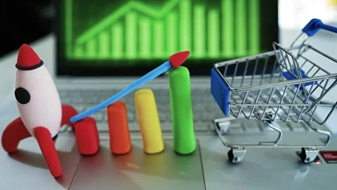 Clay Rocket and Bar Graph Symbolizing Growth, Colorful clay rocket and bar .. 動画素材 304878636