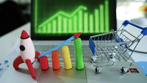 Clay Rocket and Bar Graph Symbolizing Growth, Colorful clay rocket and bar .. Видео 304878671