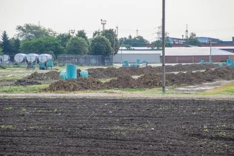Clay slides are raw materials for brick factory. Storage of clay for making b Stock Photos