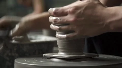 Clay spindle shaping pottery design on wheel by professional potter artist. Stock Footage 239605016