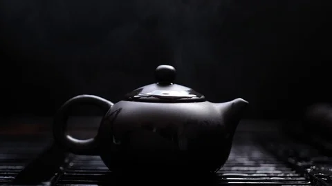 Clay teapot steamed on tea table Stock Footage 113113156