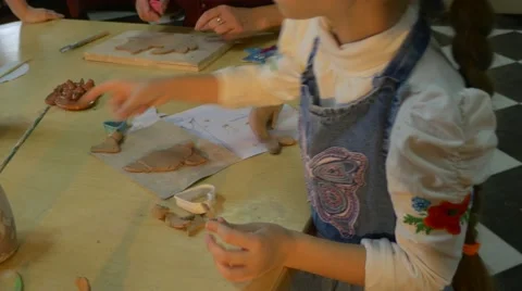 Clay Toy is Made by a Nice 6 Year Old Girl and a Professional Lady, Who Sit at Stock Footage 59128259