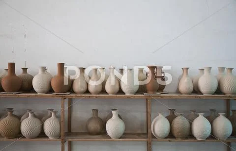 Clay Vases On Shelves