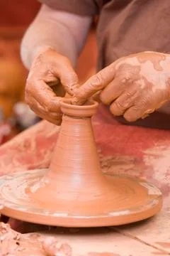 Clay on the wheel-head. Stock Photos