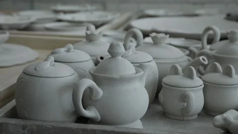 Clay workshop. Billets of teapots for welding, sugar bowl. Panorama. Video stock 130526263