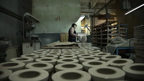 Clay workshop. Preparation of a mold for a clay Cup. Grayscale. General plan Video stock 130526299