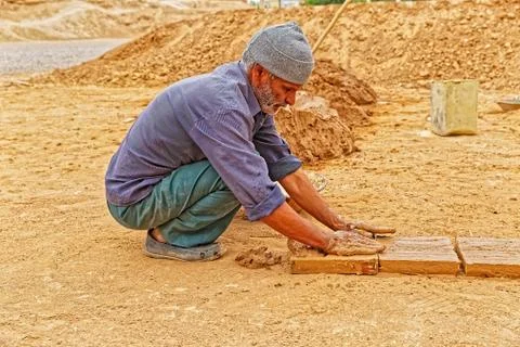 Clayman making bricks Stock Photos