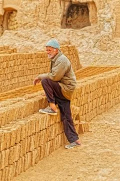 Clayman making bricks Stock Photos