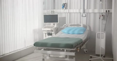 Clean and empty room with a bed in new medical center Stock Footage 150642543