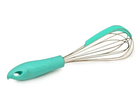 Clean and modern kitchenware whisk stationary on neutral white background f.. Stockfoto's