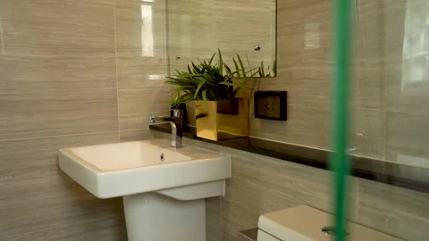 Clean and Nice Beige Tile Wall Bathroom, Walkthrough Vídeos de archivo 250121291