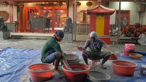 Clean The Ashes in a Buddhist Temple Stock Footage 123446773