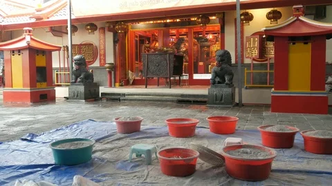 Clean The Ashes in a Buddhist Temple Stock Footage 123451446