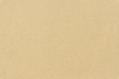 Clean beach sand texture close-up Stock Photos