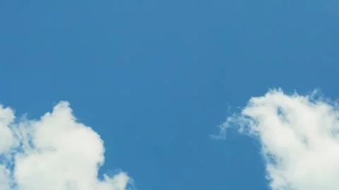 Clean Blue Sky and Some Puffy Cotton White Clouds in Sun Light Time Lapse. Pure  Stock Footage 317821060