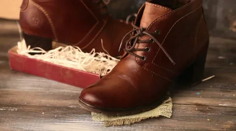 Clean boots shoes Stock Footage 65438032